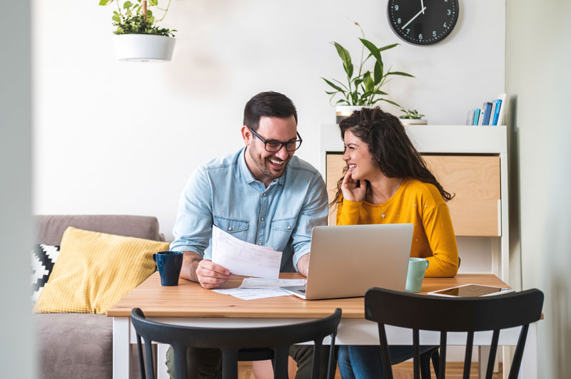 a couple planning for the future with a financial advisor