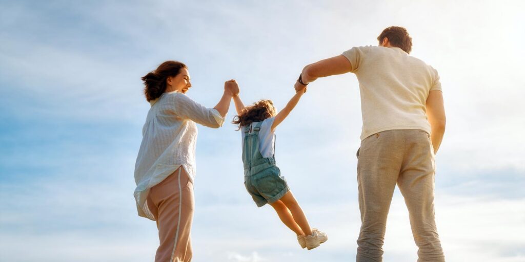 a family having fun on the beach together