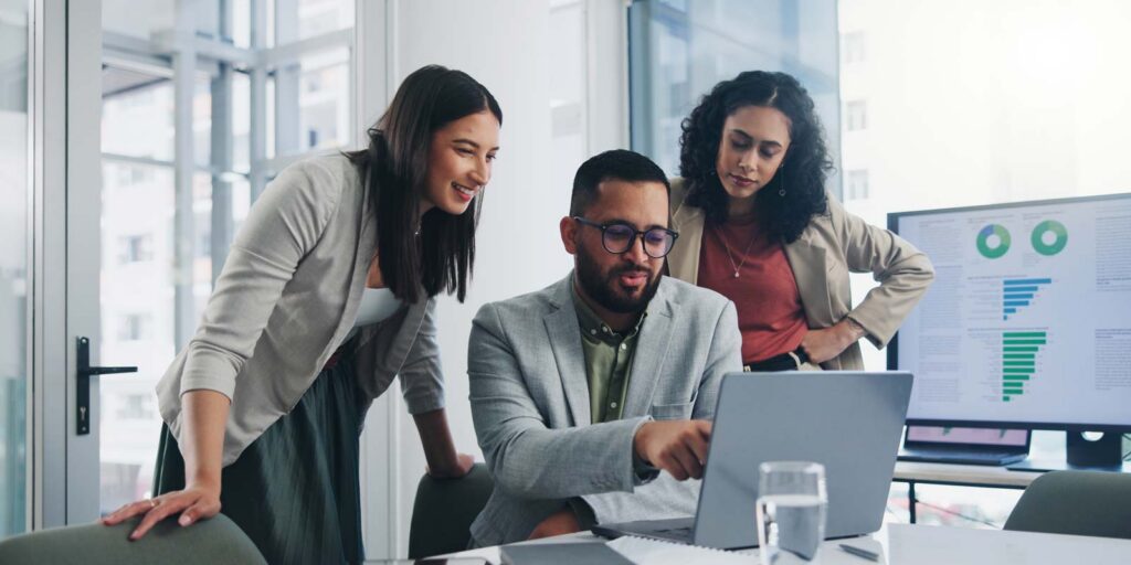 corporate executives working with a financial advisor to discuss business strategy