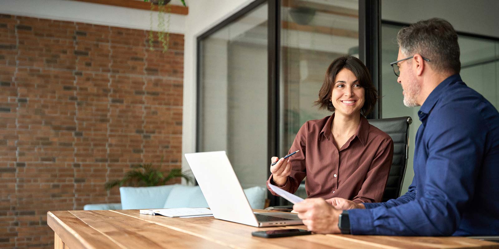 financial planning advisor working with a small business owner