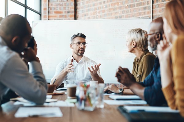 generational wealth management team discussing latest strategies with a board of directors