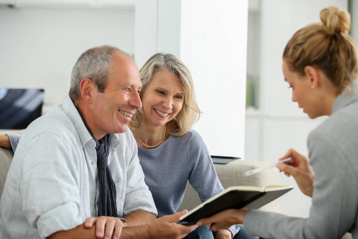 older couple discussing their tax planning strategy with their kirk capital agent