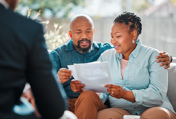 older couple reviewing the tax planning proposed by their agent at kirck capital