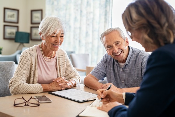 a senior couple meeting with their family office advisor with kirk capital advisors