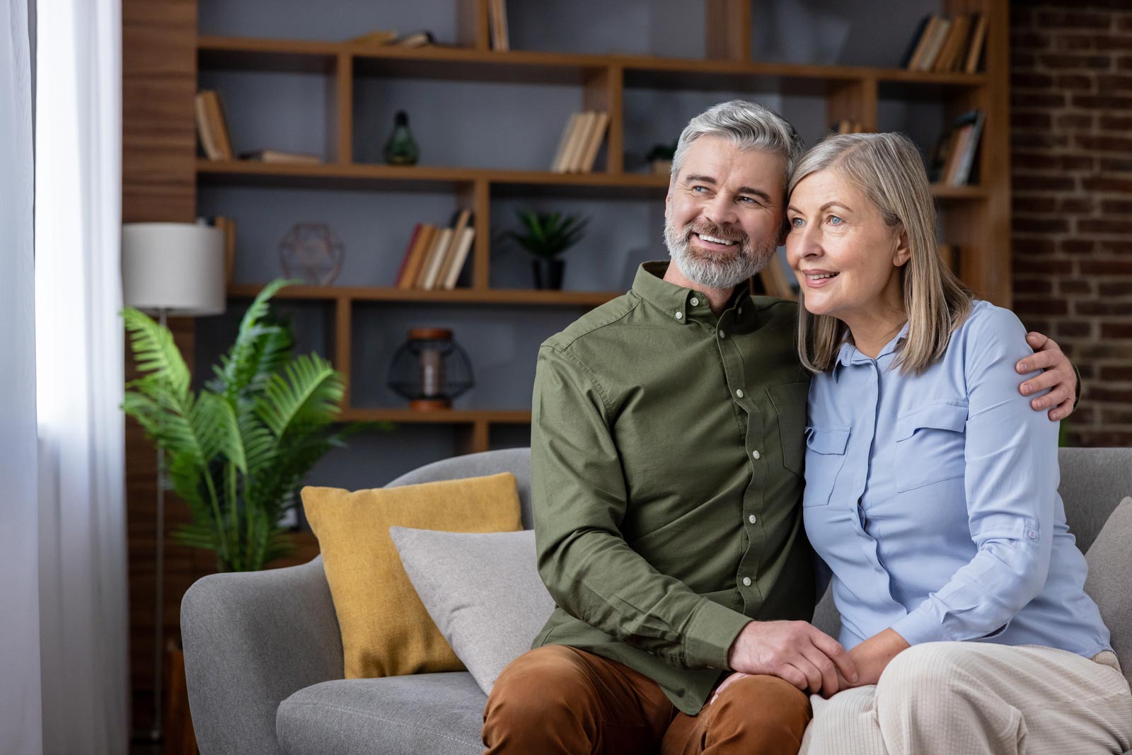 an older couple living happily after working with a financial advisor