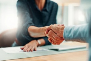 deal and business people in office with agreement, contract or finance partnership
