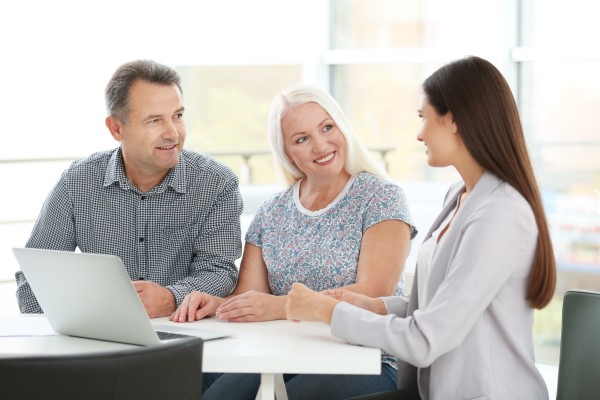 mature couple having a consultation with kirk capital advisors