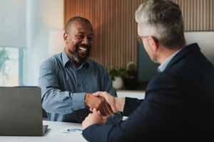 shaking hands, collaboration and business men in office for finance partnership, agreement or deal