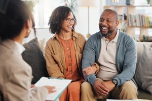 financial advisor, planning and mature couple on sofa for estate deal