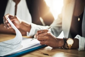 hands, sign and people with document, office and approval for home loan and process for application